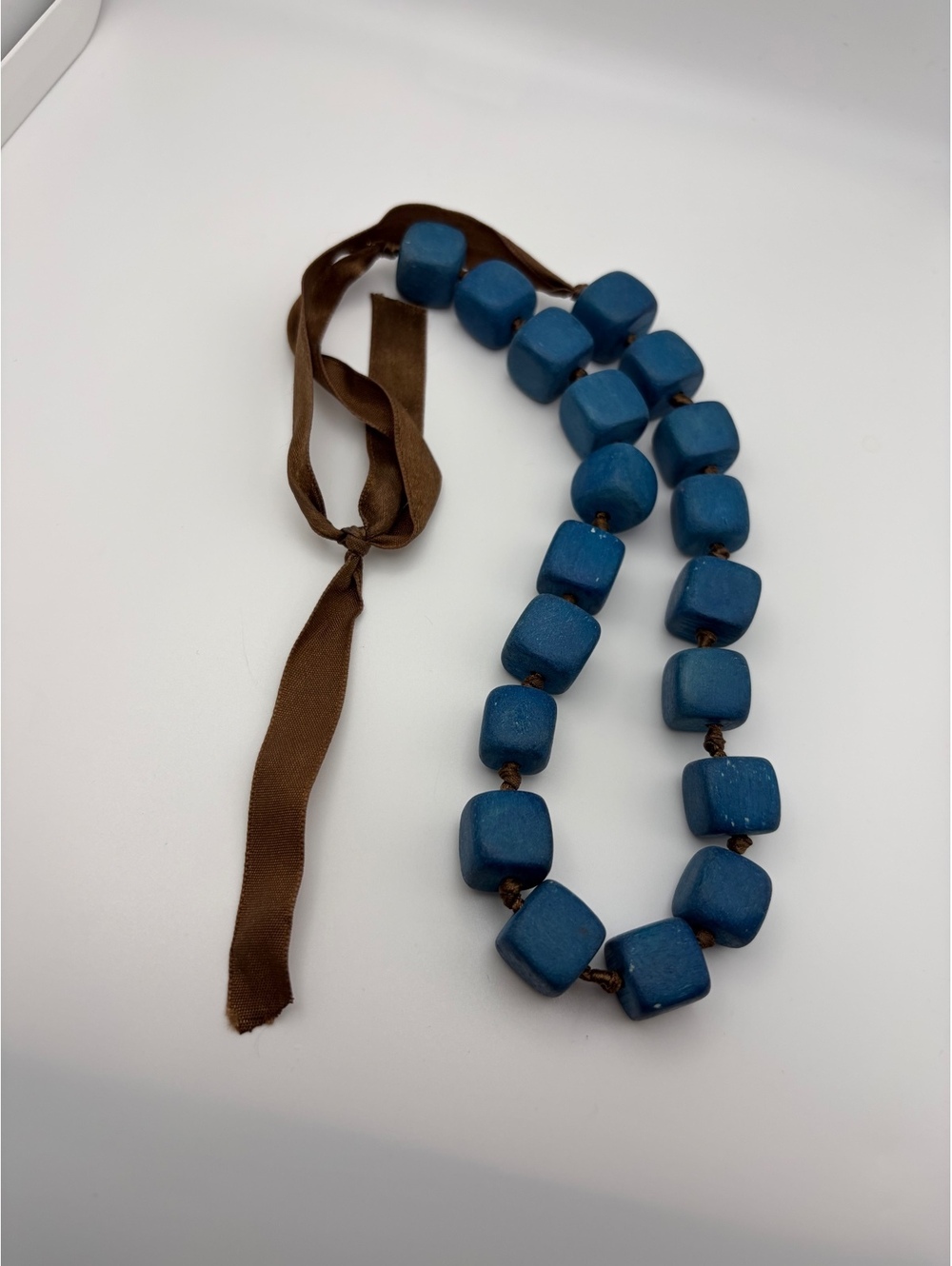 Blue wooden bead ribbon necklace